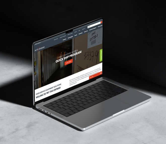 A laptop with the Alto-Shaam website showing on its screen.